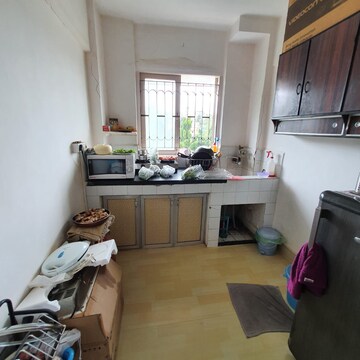 Kitchen in 2 BHK Apartment at New Home Paradise Apartment, Virar West – for Sale