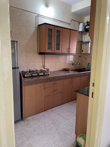 Kitchen in 2 BHK Apartment at Harbour Court, Sector 19a – for Sale