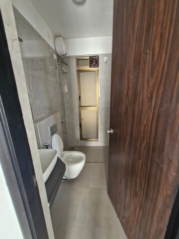 Bathroom in 2 BHK Apartment at Raymond Ten X Habitat, Pokhran Road No 2 – for Rent