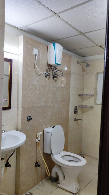 Bathroom in 3 BHK Apartment at Sunshine Helios, Sector 78 – for Rent