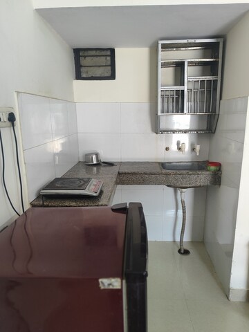 Kitchen in Studio Apartment at Varun Enclave, Sector 28 – for Rent