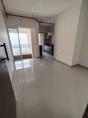 Living Room in 1 BHK Apartment at JP North Aviva, Mira Road – for Rent