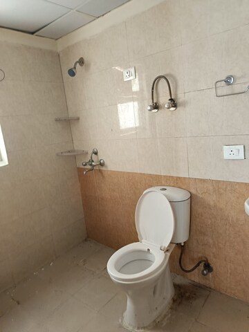 Bathroom in 2 BHK Apartment at Aims Golf City, Sector 75 – for Rent