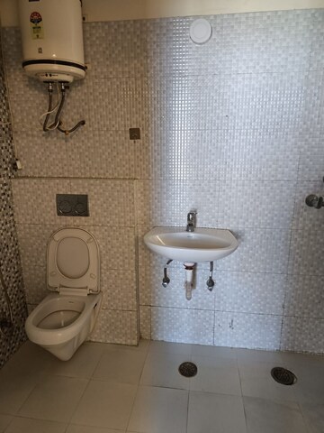 Bathroom in 3 BHK Apartment at Gardenia Golf City, Sector 75 – for Rent