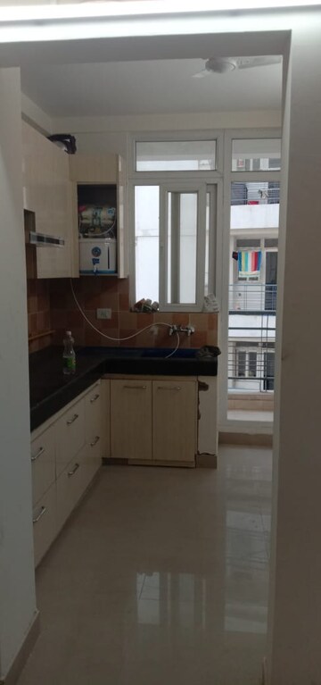 Kitchen in 3 BHK Apartment at Samridhi Luxuriya Avenue, Sector 150 – for Sale