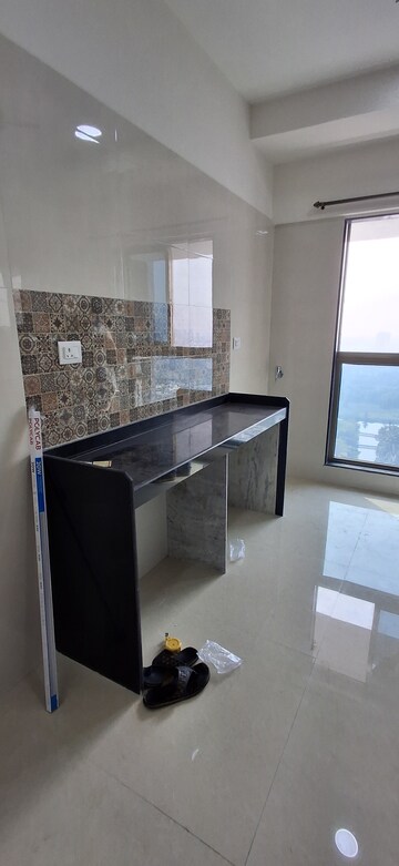 Kitchen in 2 BHK Apartment at Rajesh Raj Infinia, Malad West – for Rent