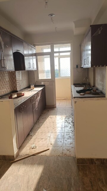 Kitchen in 3 BHK Apartment at Amrapali Silicon City, Sector 76 – for Rent