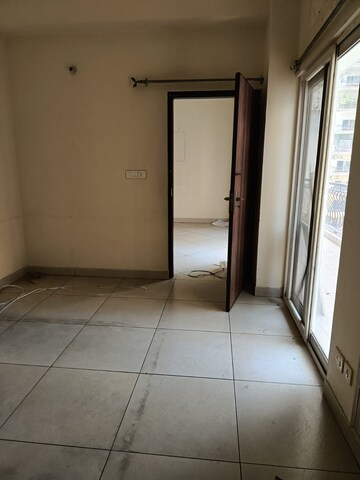 Building Lobby in 2 BHK Apartment at Amrapali Silicon City, Sector 76 – for Rent