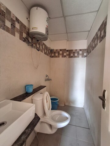 Bathroom in 3 BHK Apartment at Sushma Valencia, International Airport Road – for Rent