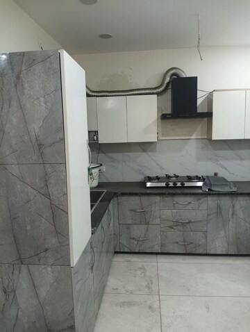 Kitchen in 3 BHK Builder Floor at Dhakoli Village – for Sale
