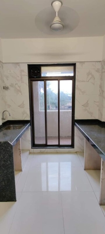 Kitchen in 1 BHK Apartment at Karanjade – for Sale