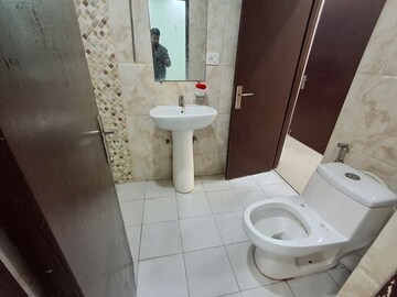 Bathroom in 3 BHK Apartment at Mahagun Mywoods, Sector 16c Greater Noida – for Rent