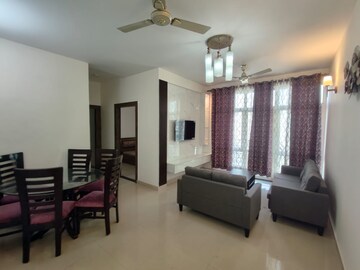 Living Room in 2 BHK Apartment at Omaxe Grand, Sector 93b – for Rent