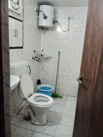 Bathroom in 2 BHK Apartment at Adore Happy Homes, Sector 86 – for Sale