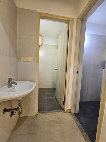 Bathroom in 1 BHK Apartment at Lodha Casa Rio, Dombivli East – for Rent