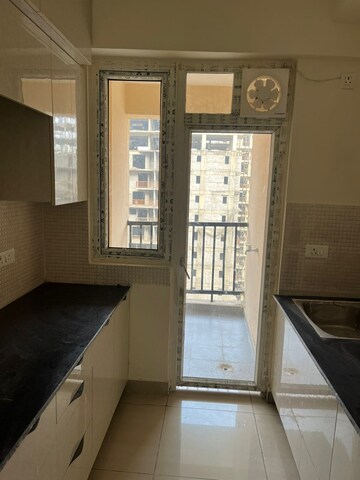 Kitchen in 3 BHK Apartment at Mahagun Mywoods II, Sector 16c Greater Noida – for Rent