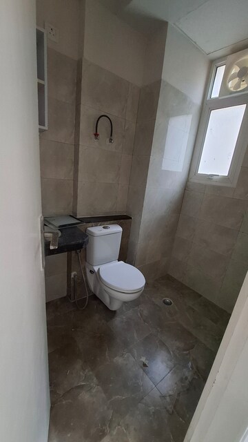 Bathroom in 2 BHK Apartment at Wave Executive Floors, Wave City – for Rent