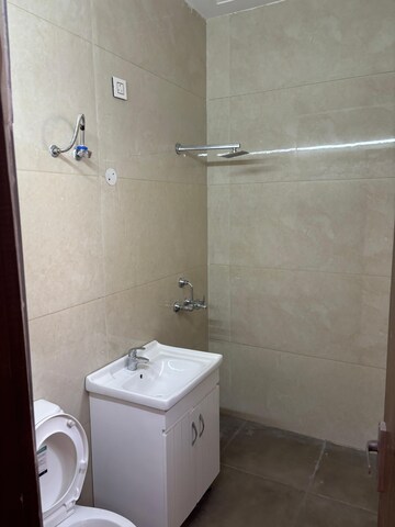 Bathroom in 3 BHK Builder Floor at Dhakoli Village – for Rent