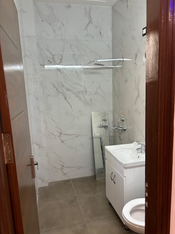 Bathroom in 3 BHK Builder Floor at Dhakoli Village – for Rent