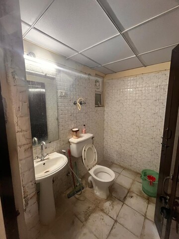 Bathroom in 2 BHK Apartment at Gaur City 2 - 10th Avenue, Sector 16c Greater Noida – for Rent