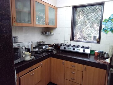Kitchen in 2 BHK Apartment at Vasant Vihar – for Rent