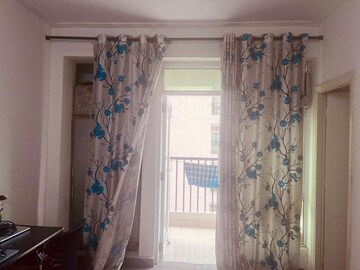 Living Room in 2 BHK Apartment at Gaur City 2 - 12th Avenue, Sector 16c Greater Noida – for Rent