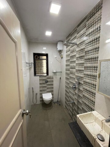 Bathroom in 1 BHK Apartment at Sethia Imperial Avenue, Malad East – for Rent