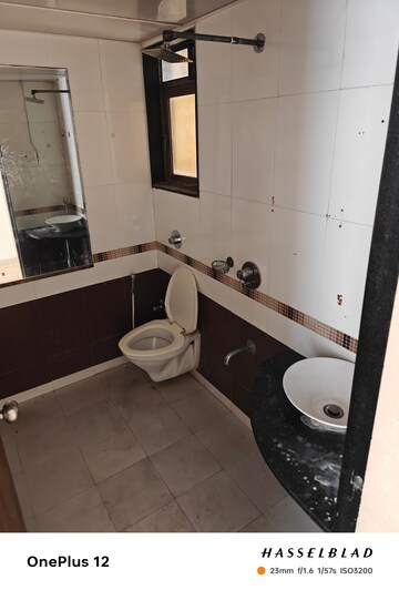 Bathroom in 2 BHK Apartment at Pearl Heights, Yari Road – for Rent