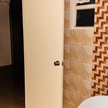 Bathroom in 3 BHK Apartment at Gaur Atulyam, Omicron I Greater Noida – for Rent