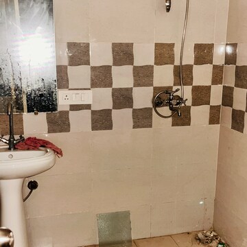 Bathroom in 3 BHK Apartment at Gaur Atulyam, Omicron I Greater Noida – for Rent
