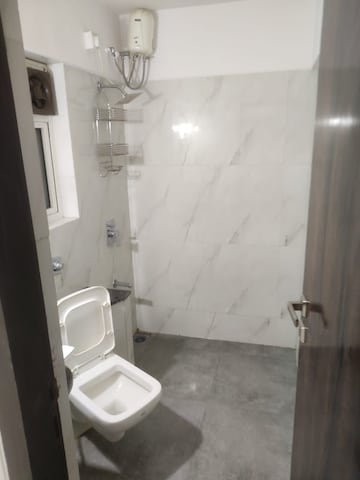 Master Bedroom in 1 BHK Apartment at Millionaire Heritage, Andheri West – for Rent