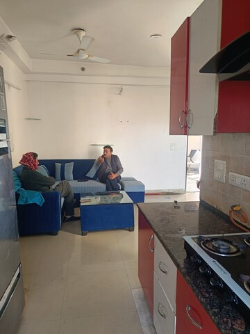 Living Room in 2 BHK Apartment at Gardenia Golf City, Sector 75 – for Rent