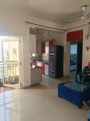 Living Room in 2 BHK Apartment at Gardenia Golf City, Sector 75 – for Rent
