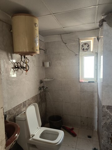 Bathroom in 2 BHK Apartment at Gardenia Golf City, Sector 75 – for Rent