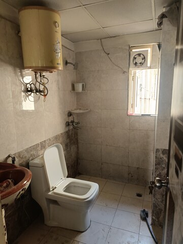 Bathroom in 2 BHK Apartment at Gardenia Golf City, Sector 75 – for Rent