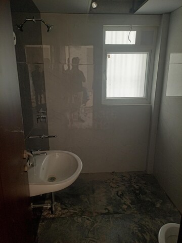 Bathroom in 3 BHK Apartment at Ambience Courtyard, Manikonda – for Rent
