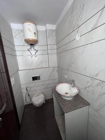 Bathroom in 2 BHK Builder Floor at Kalkaji – for Rent