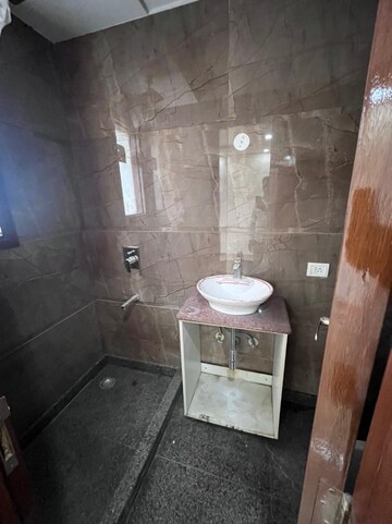 Bathroom in 2 BHK Builder Floor at Kalkaji – for Rent