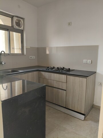 Kitchen in 1 BHK Apartment at Hiranandani Lavinia, Ghodbunder Road – for Sale