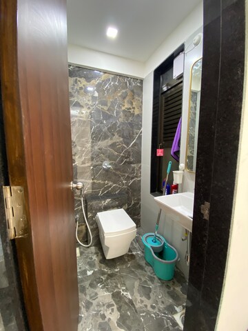 Bathroom in 1 BHK Apartment at Hirani Om Sukhkarta Heights, Vikhroli East – for Rent