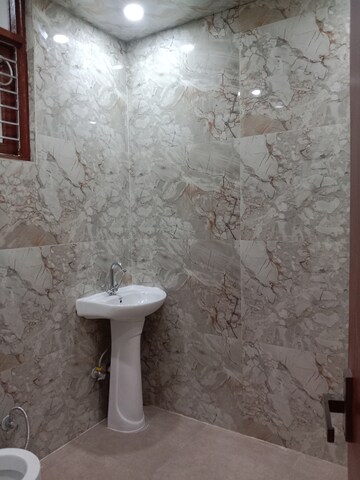 Bathroom in 3 BHK Builder Floor at Soho Apartments, Shakti Khand – for Sale