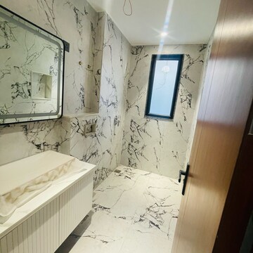 Bathroom in 4 BHK Builder Floor at Auram Floor, South City 2 – for Sale