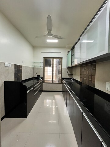 Kitchen in 2.5 BHK Apartment at Oberoi Realty Woods, Goregaon East – for Rent