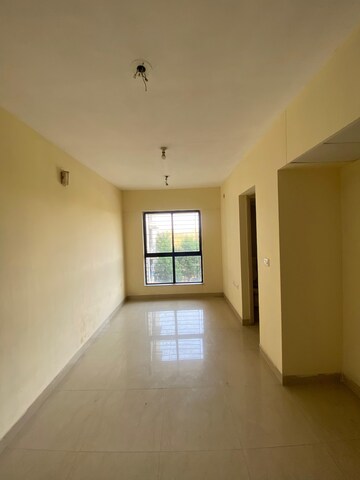 Living Room in 1 BHK Apartment at Lodha Crown Quality Homes Dombivli, Dombivli East – for Rent
