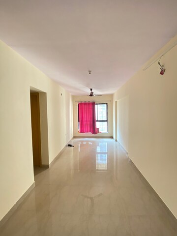 Living Room in 1 BHK Apartment at Lodha Crown Quality Homes Dombivli, Dombivli East – for Rent