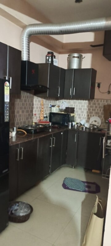 Kitchen in 2 BHK Apartment at Supertech Livingston, Sain Vihar – for Sale