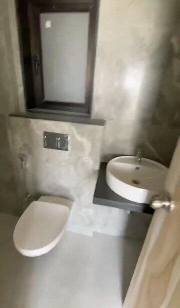 Bathroom in 1 BHK Apartment at DB Orchid Ozone, Dahisar East – for Rent