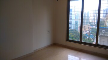 Room in 2 BHK Apartment at HK Orchid Residences, Andheri West – for Rent