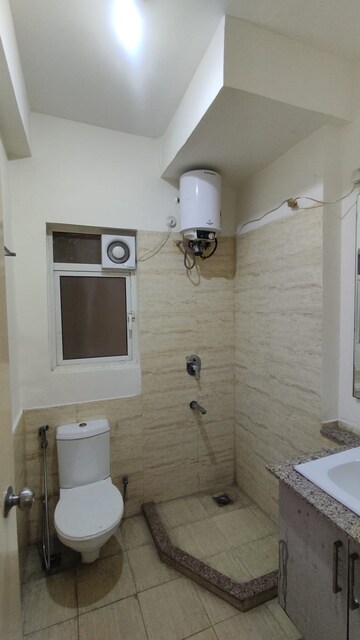 Bathroom in 3 BHK Apartment at Moti Nagar – for Rent