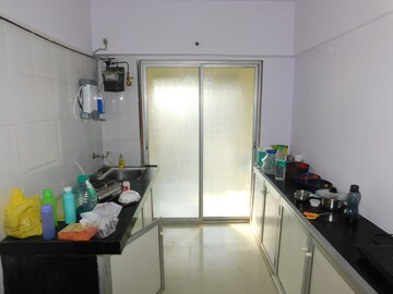 Kitchen in 1.5 BHK Independent House at Chattarpur – for Sale